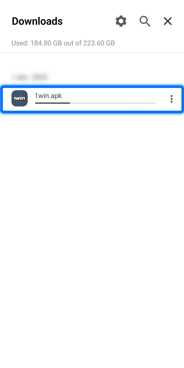 Wait while the latest 1win app files download to your device for improved performance.
